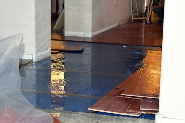 Professional Flood Damage Restoration technician working in South Dartmouth, MA